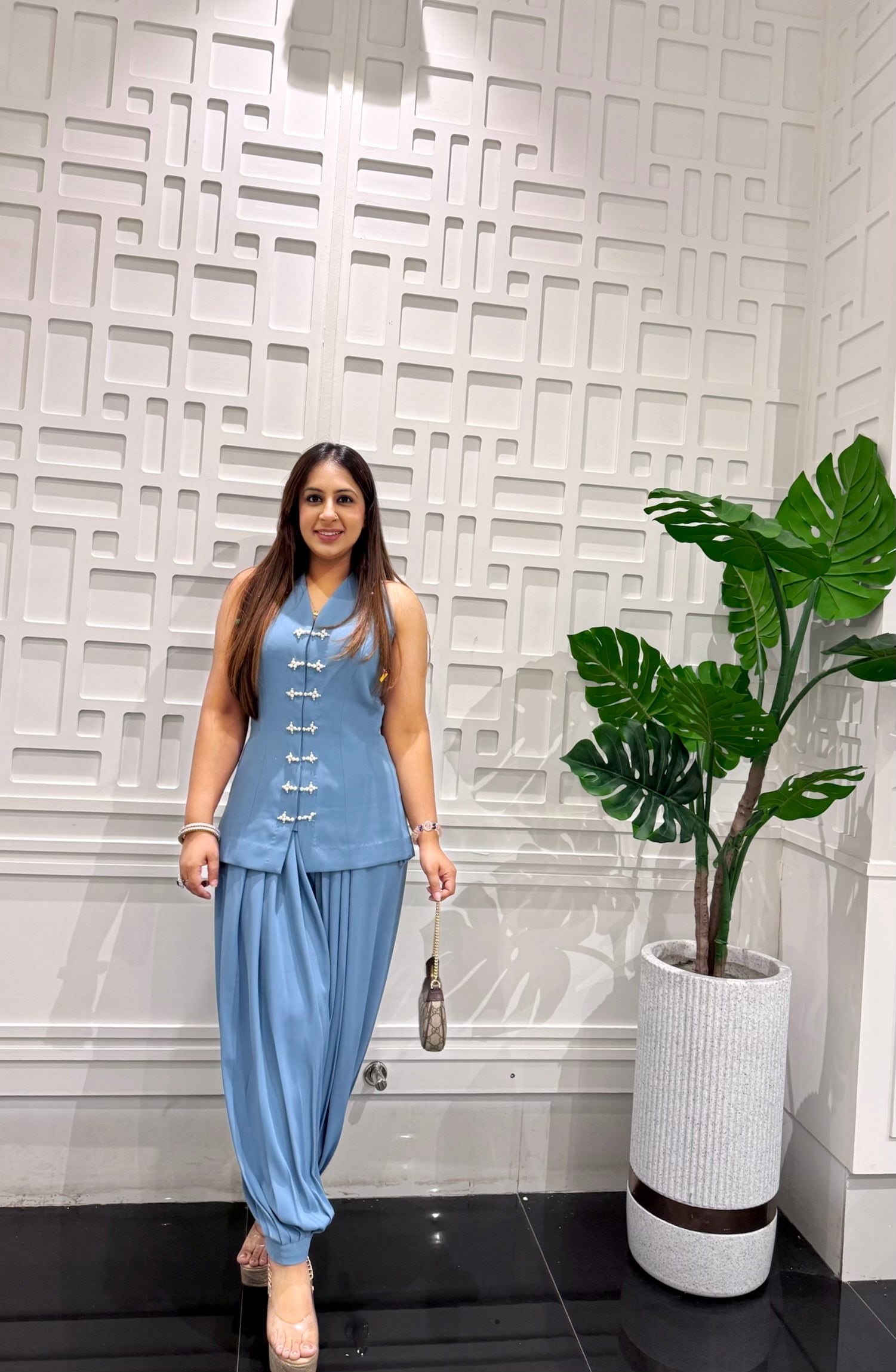 Powder Blue Pearl Button Balloon Pants Co-ord Set in French crepe by Bhawika Sachdeva — full-length view of the sleeveless mandarin vest and draped balloon pants