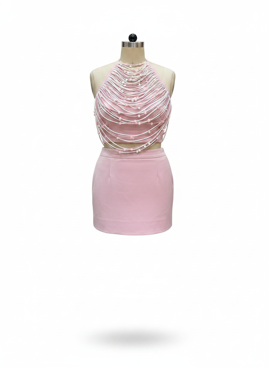 Pink French satin halter co-ord set with hand-strung beaded fringe overlay and matching mini skirt on white background